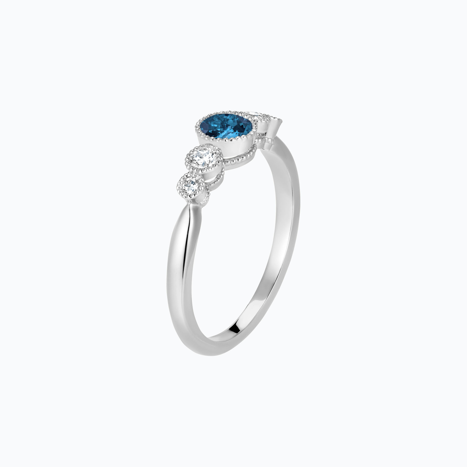 Solitaire Paloma Millegrain Topaze Blue London 4.5 mm